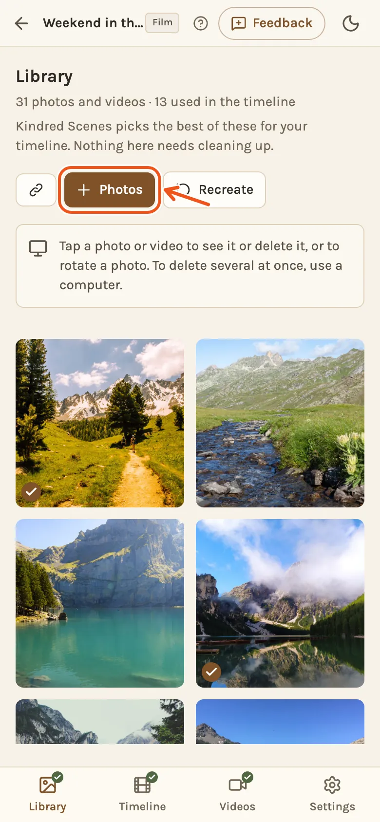 A phone showing the Library tab, with Photos marked at the top.
